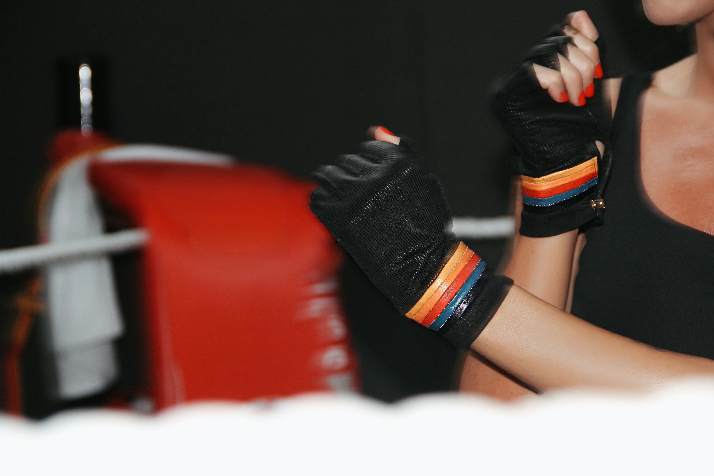 Roxy leather gloves with striped cuff on a red punching bag