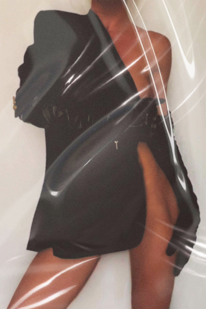 A black leather glove wrapped around a woman’s waist, visible beneath a transparent layer of crinkled plastic, paired with an asymmetrical blazer revealing the leg.